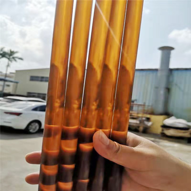 Amber PEI rod being machined