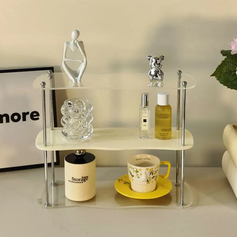 3 layer acrylic perfume shelf with perfumes and cosmetics