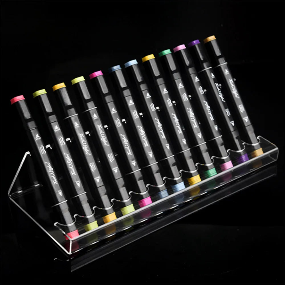  Clear acrylic marker pen display stand showcasing 6 pens in a modern, organized workspace.