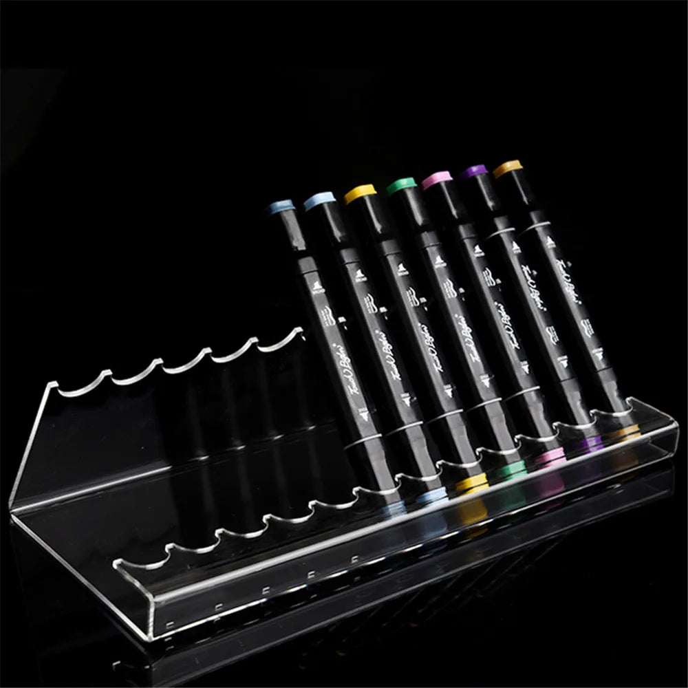 Close-up view of clear acrylic marker pen display highlighting its sleek design and transparent material