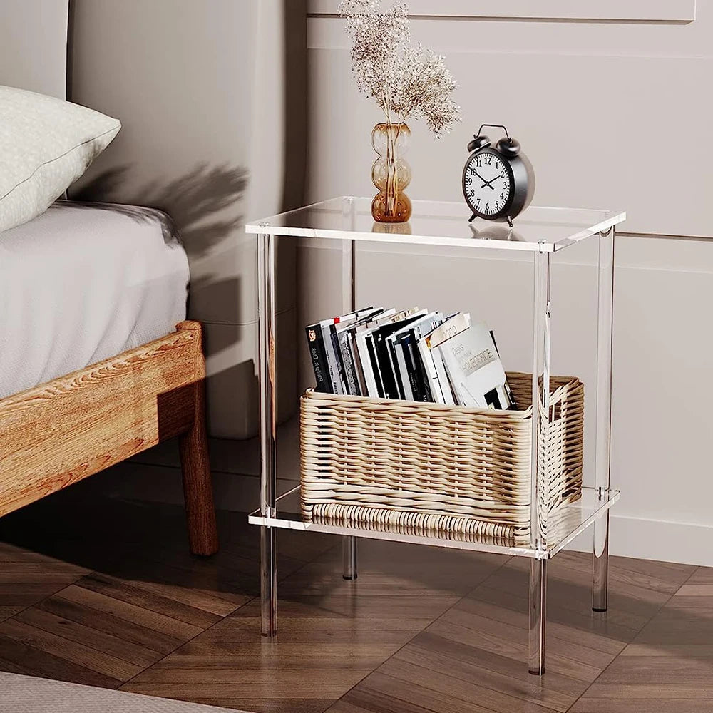 Modern acrylic side table in living room with sofa and coffee table