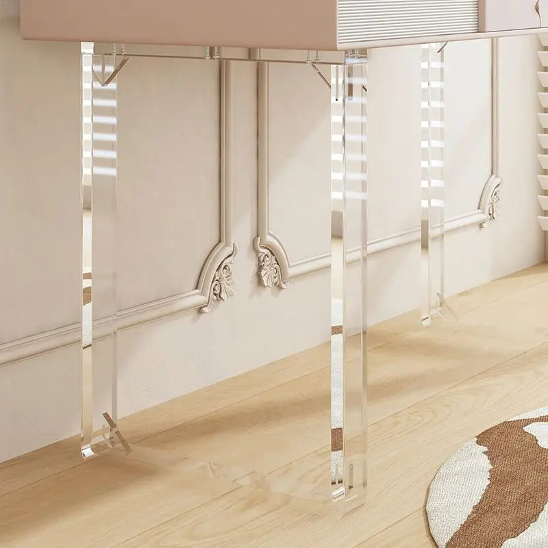 A transparent acrylic table leg in a lifestyle setting