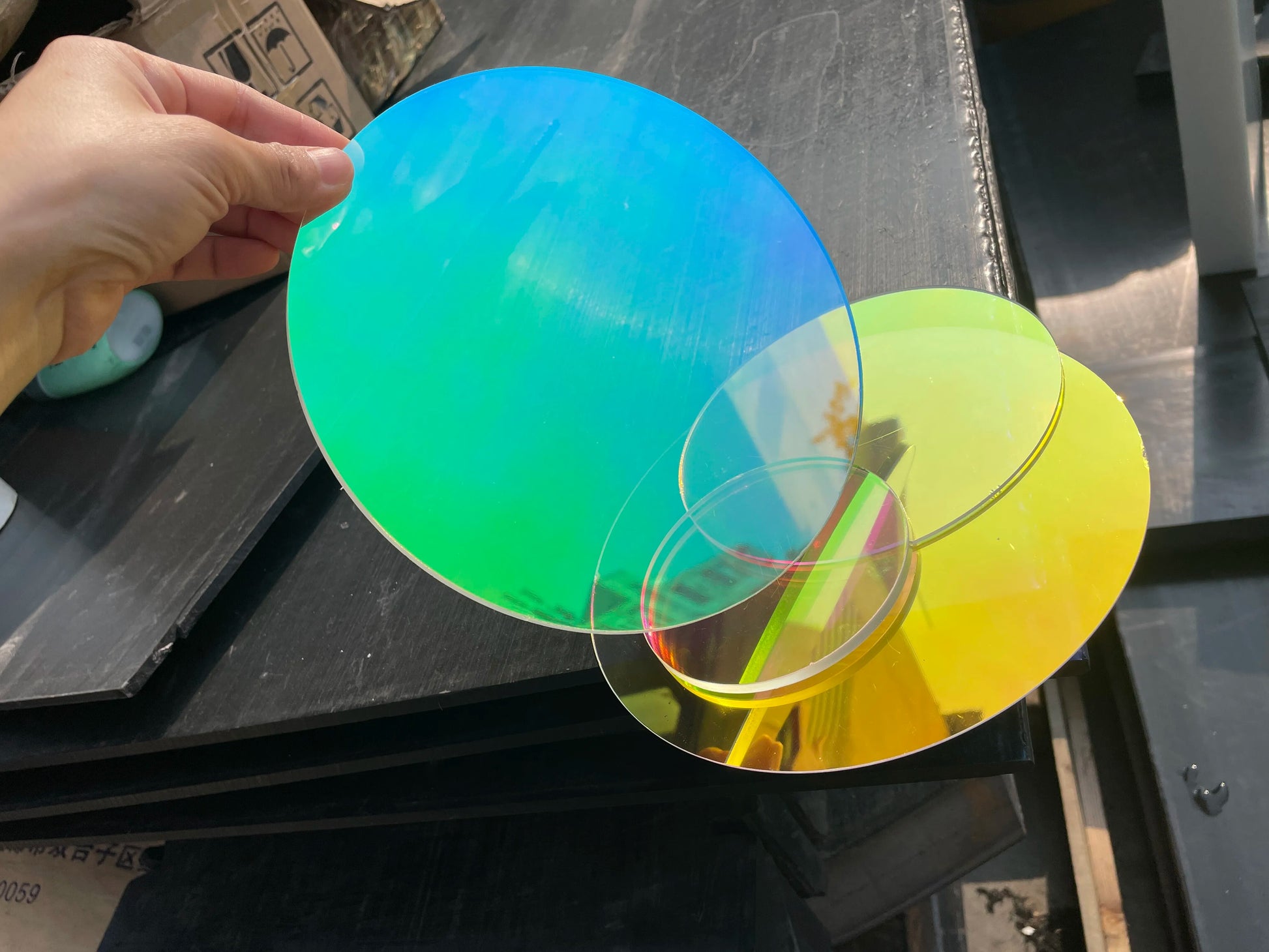 A sheet of iridescent acrylic being used to decorate a home